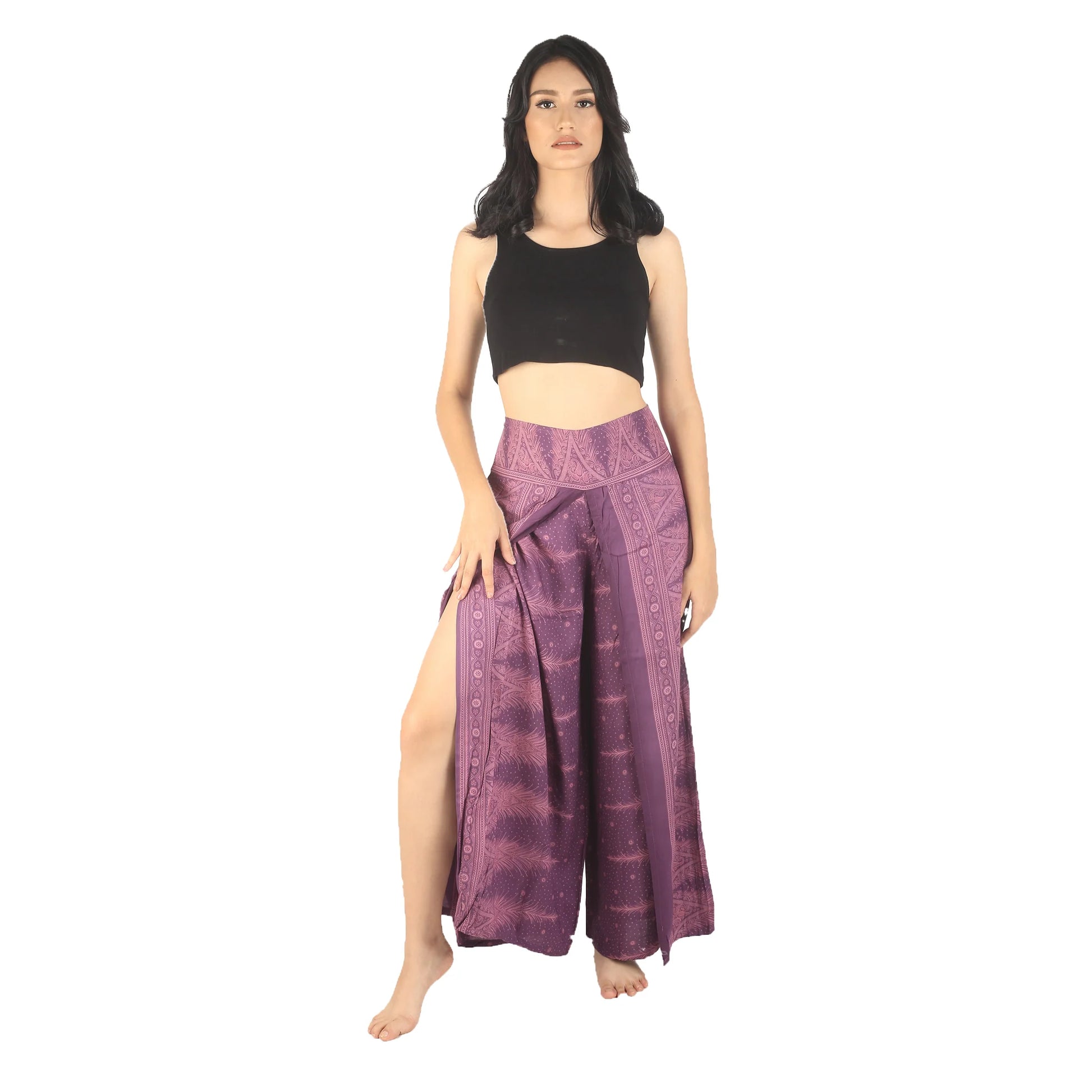 Woman wearing boho purple printed wide-leg rayon pants with side slits and elastic back waist paired with black crop top